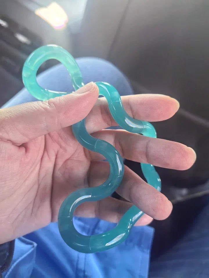 Deformable Temperature Acute Color Changing Twisting Decompression Knot Toy - Zelvo